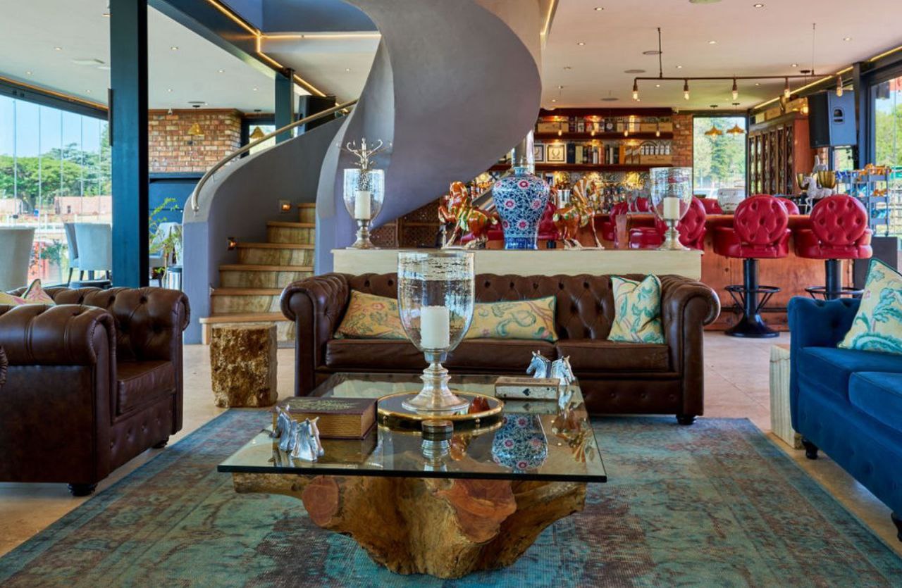 Spacious glass clubhouse with beautiful lighting